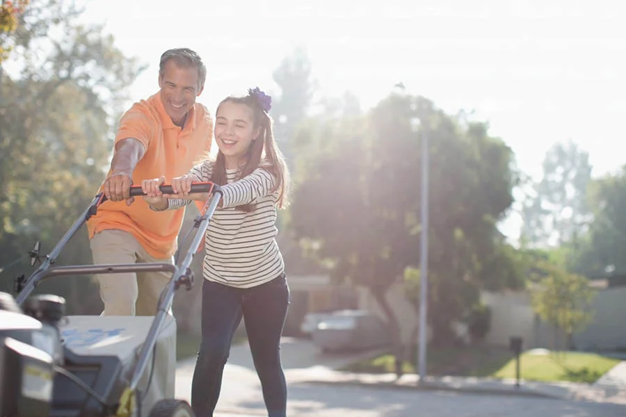 self-propelled electric lawn mower with battery and charger